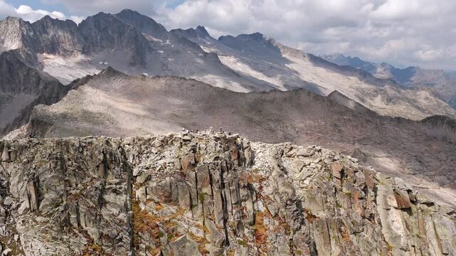 Aerial view of shrinking Monte Perdido glacier and exposed rock face due to climate change, Pyrenees, Spain