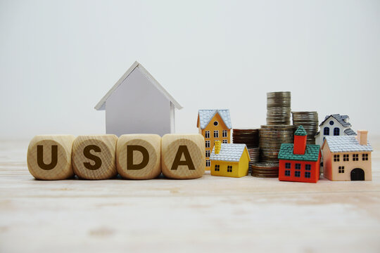 NRSF (Net Rentable Square Feet) alphabet letters with house model and coin stack