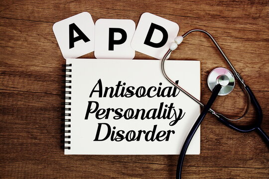 APD Antisocial Personality Disorder text written on notepad with stethoscope on wooden background