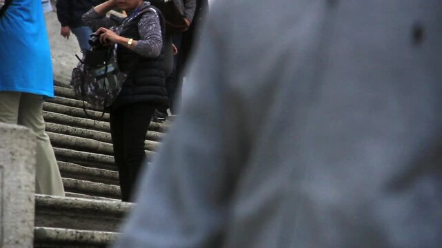 Low Angle View Of Tourists Walking On Spanish Steps In Piazza Di Spagna Rome On Rainy Day