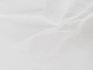 Fototapeta premium White translucent fabric texture with layered soft folds
