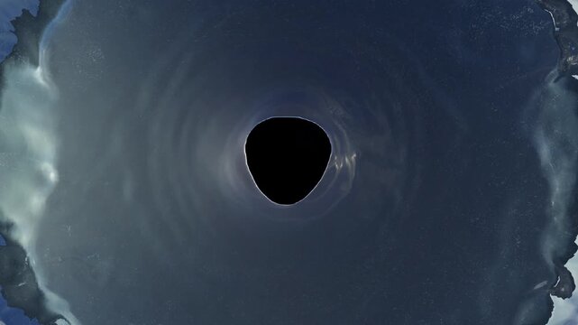 3D simulation of a water whirlpool just starting to form, dark blue water with a smooth black vortex opening and gentle ripples, no foam, top view