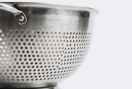 Stainless steel colander with perforated holes