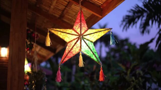 Traditional Filipino Christmas Parol Swaying Gently in the Evening Breeze on a Veranda
