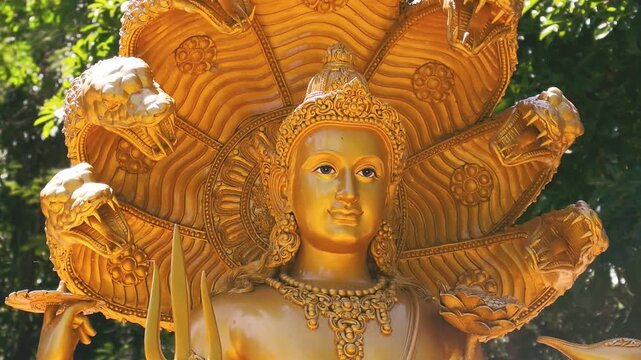 Real-time Close-up Portrait of Golden Lord Vishnu Statue