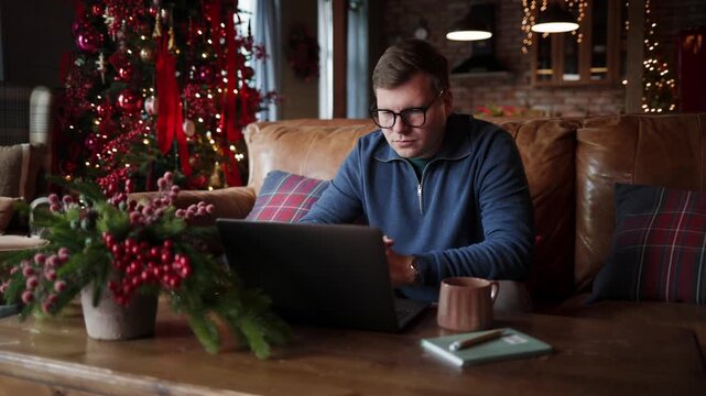 Upset Young Businessman Checking His Laptop and Reacting to an Unfavorable Financial Result, Investment Loss, Money Problems, Financial Stress, Personal Finance