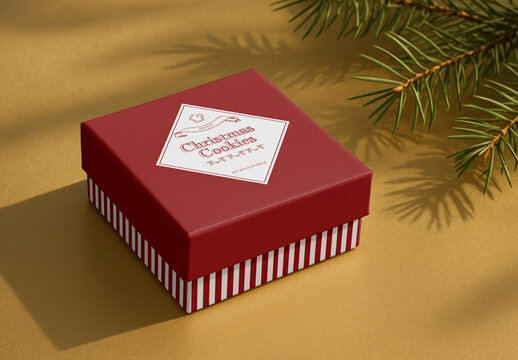 Festive Gift Box Mockup Under Tree PSD