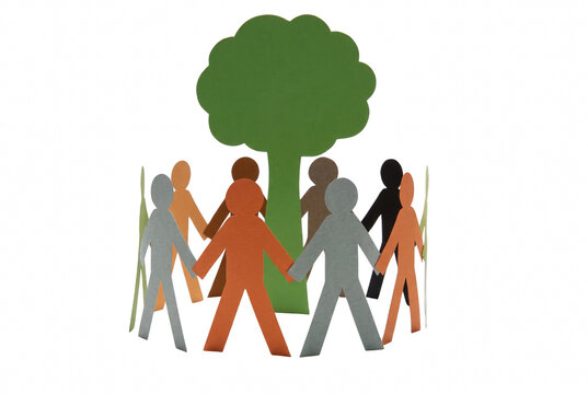 Diverse paper cutouts of people holding hands around a green tree