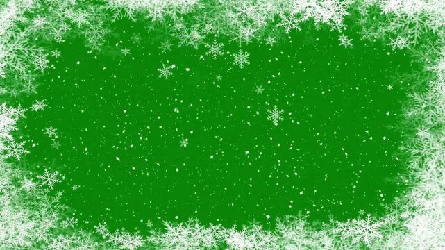 Festive winter snow border frame with falling flakes on a keyable chroma key green screen background