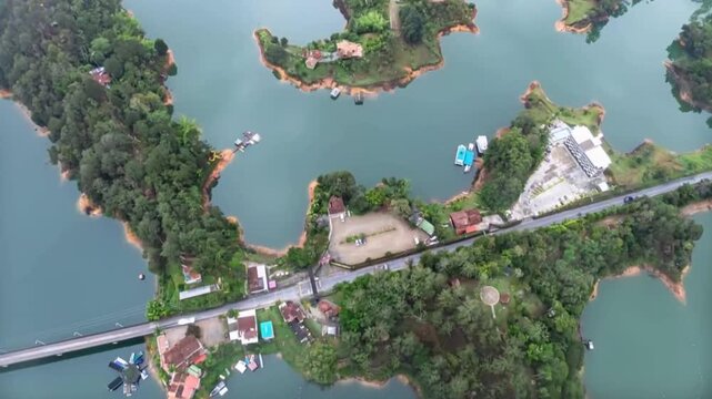 Guatap&eacute; Reservoir with Scenic Islands and Mountain Landscape in Antioquia, Colombia. Time Lapse. Establishing Shot. Aerial View.