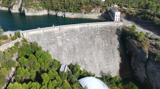 Aerial view of Talarn dam and low water levels at Panta de Sant Antoni reservoir in Spanish Pyrenees, Lleida, Spain