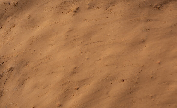 Soil wall texture of old clay house structure. Mud home.