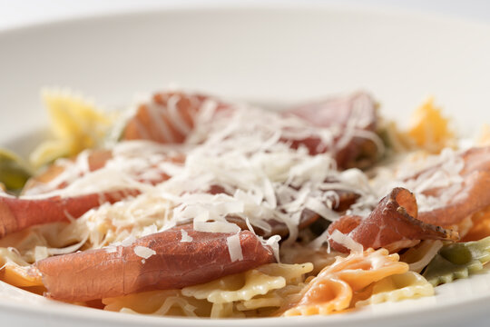Farfalle pasta with pork coppa and parmesan cheese