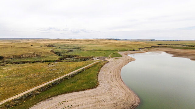 Aerial view of a reservoir with very low water levels