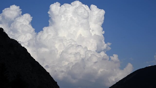 Timelapse of large cloud formation and storm brewing over Pyrenees mountains, Ordesa National Park, Spain