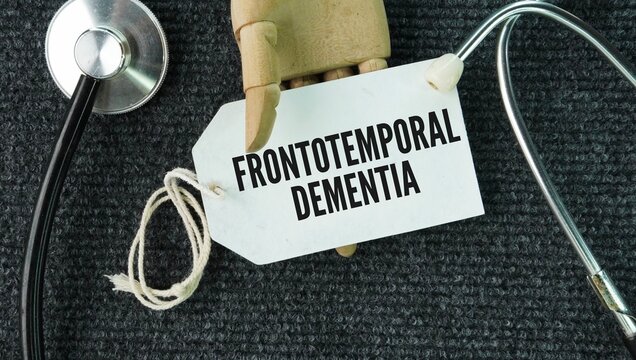 Stethoscope and paper tag with the word Frontotemporal dementia FTD is a group of progressive brain disorders that damage the frontal and temporal lobes of the brain, which control behavior, personali