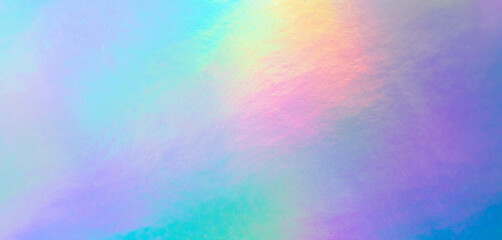 Obraz na płótnie Canvas Holographic rainbow foil iridescent texture abstract hologram background