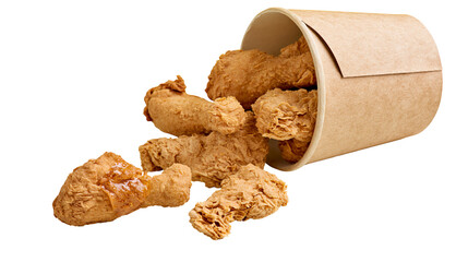 Crispy golden fried chicken drumsticks spilling out of a brown paper bucket © Sini