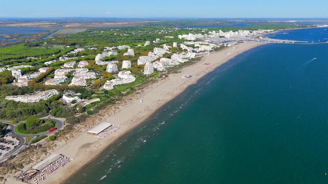 Aerial view of people swimming and relaxing on the beach in La Grande-Motte, H&eacute;rault, South of France