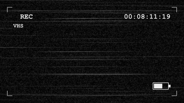 Retro VHS camera viewfinder overlay with digital recording indicator and battery status display on grainy black screen