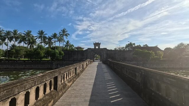 Stone bridge leading directly to the entrance gate of Quang Tri Ancient Citadel in Vietnam.