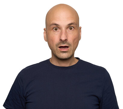 shocked bald man with wide‑open eyes and a slightly parted mouth