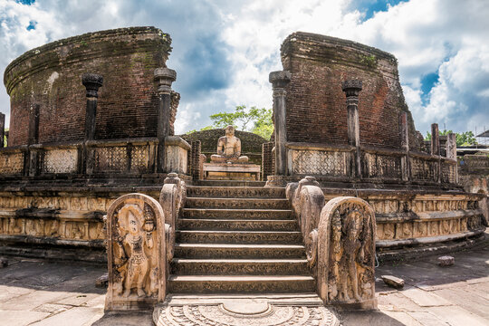 Ancient Buddhist Temple Ruins (Vatadage) and Seated Buddha Statue in Polonnaruwa,  Sri Lanka