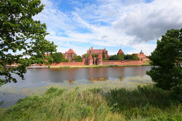 Malbork, Poland. A 14th-century Teutonic castle housing a museum of medieval artifacts, paintings, and amber collections. © skorpionik00
