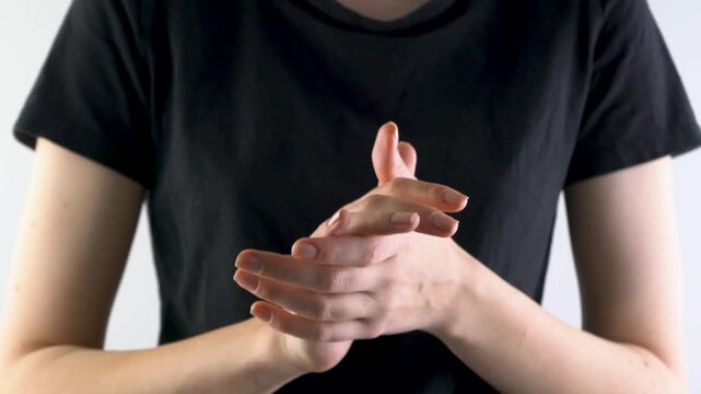 Man demonstrating hand movements focusing on finger position. Neurogymnastics exercises for hands.
