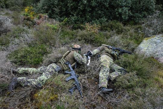 Hit airsoft player calling it out aloud and stopping play, in line with fair play rules, during a game near Carcassonne, France