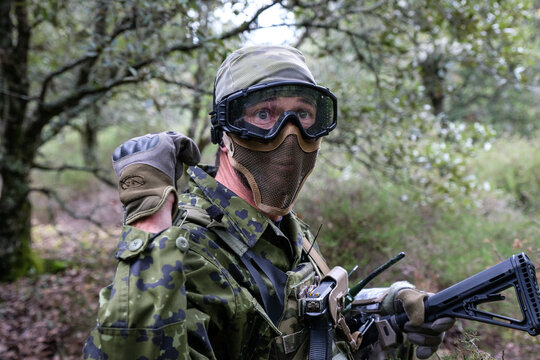 Airsoft player wearing compulsory protective goggles during a twenty four hour war game near Carcassonne, France