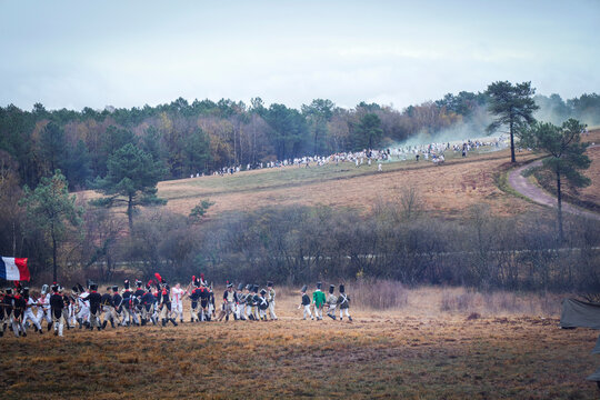 Columns manoeuvring across a small valley during a reenactment of the battle of Austerlitz, Guer, France