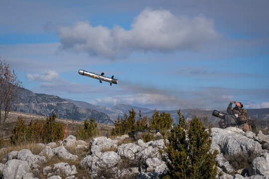 Medium range anti tank missile picking up its course just after launch during firing trials on the Canjuers military range, France