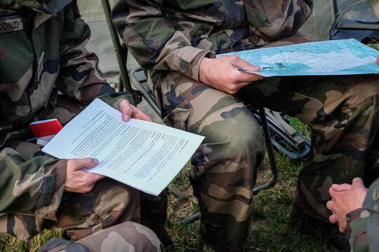 Orders given over a map during a special forces refresher course for athletes of the French military ski team, Martignas-sur-Jalle, France