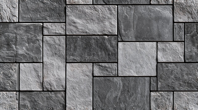 Dark gray stone wall texture background with rectangular tiles and rough surface