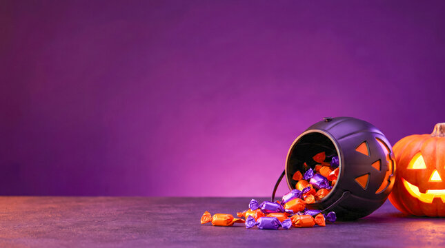 Spilled Halloween Candy Bucket With Glowing Jackolanterns
