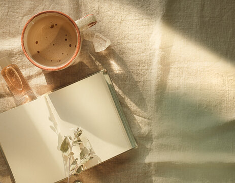 Minimalist Wellness Flat Lay with Blank Journal, Ceramic Cup and Botanical Sprig