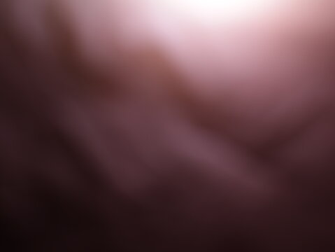 Una toma de cerca de un fondo abstracto de colores marr&oacute;n  y negro con un degradado ligero desenfocado