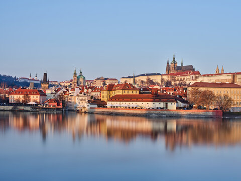 Prague Castle and St Vitus Cathedral above the Vltava at sunrise