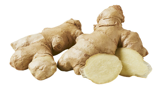 Fresh raw ginger root with sliced pieces showing fibrous texture