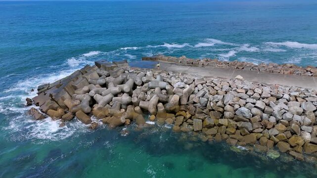 Atlantic Waves Breaking Against a Rocky Coastal Barrier