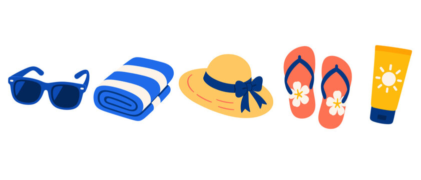 Summer beach accessories with sunglasses and striped towel