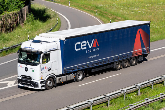 Wiehl, Germany - May 26, 2026: M+L Logistik Mercedes-Benz Actros truck with CEVA curtainside trailer on motorway
