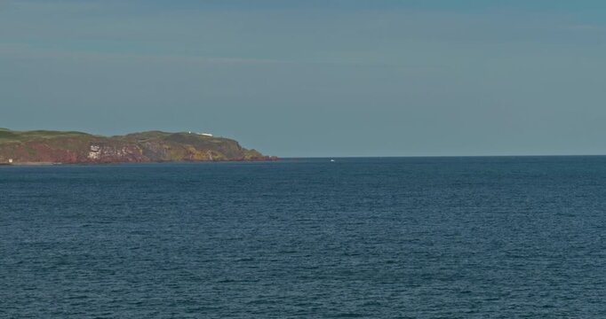 Seascape with Rugged Coastal Cliffs and Rocky Shoreline in Eyemouth