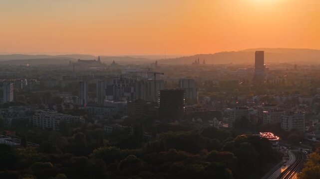 Sunset aerial view over Krakow cityscape and urban buildings, Poland