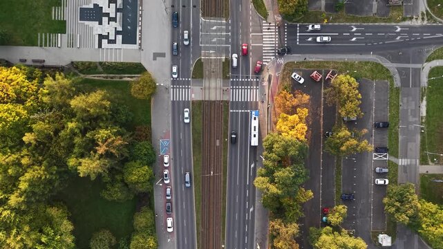Top-down aerial view of urban street traffic in Krakow city, Poland