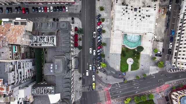 Top-down aerial view of street traffic in Bucharest city, Romania