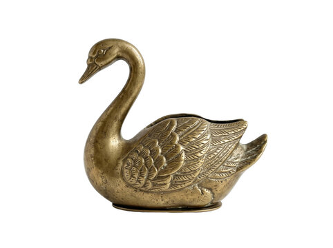 Vintage brass swan figurine isolated on a transparent background for elegant home decor and interior