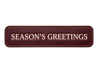 Season's greetings text embossed on a dark brown leather label with decorative stitching © Gandalf