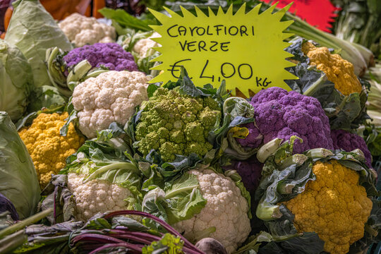 Colourful cauliflowers (Brassica oleracea var. botrytis) on a market stall